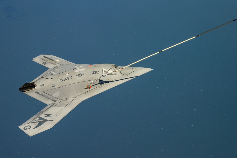 150422-N-CE233-377 PATUXENT RIVER, Md. (April 22, 2015) The Navy's unmanned X-47B receives fuel from an Omega K-707 tanker while operating in the Atlantic Test Ranges over the Chesapeake Bay. This test marked the first time an unmanned aircraft refueled in flight. (U.S. Navy photo/Released)